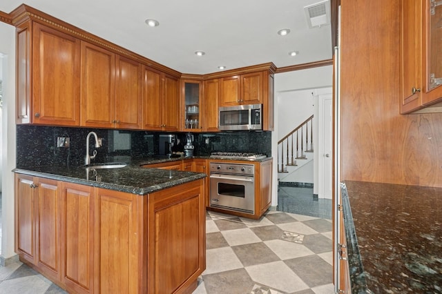 24-56 Little Neck Blvd, Bayside, NY 11360 - kitchen featuring appliances with stainless steel finishes, brown cabinetry, decorative backsplash, and recessed lighting