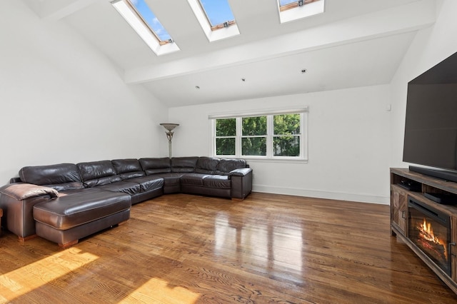 24-56 Little Neck Blvd, Bayside, NY 11360 - living area featuring wood finished floors, a glass covered fireplace, and a skylight