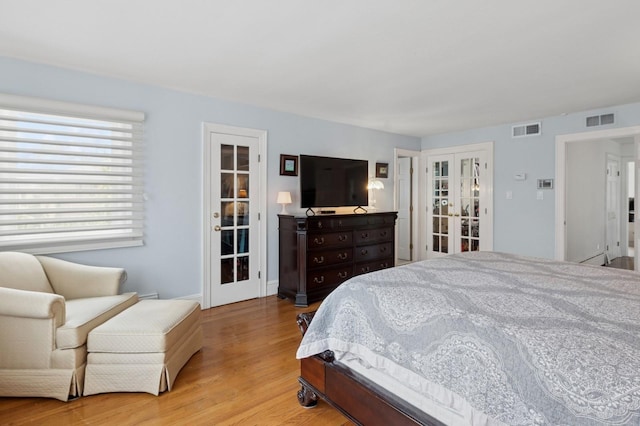 24-56 Little Neck Blvd, Bayside, NY 11360 - bedroom featuring french doors and wood finished floors