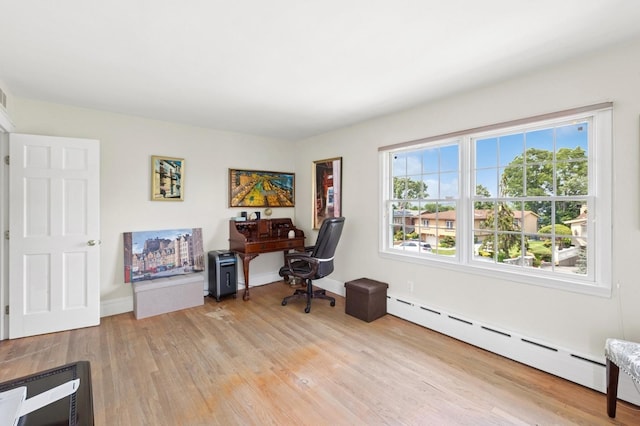 24-56 Little Neck Blvd, Bayside, NY 11360 - sitting room with baseboard heating and light wood-style flooring