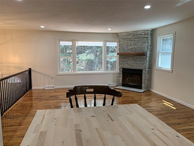 604 Basket Rd, Long Eddy, NY 12760 - living area with wood finished floors, a large fireplace, and recessed lighting
