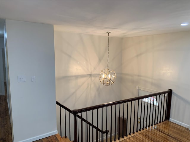 604 Basket Rd, Long Eddy, NY 12760 - staircase featuring wood finished floors and a chandelier