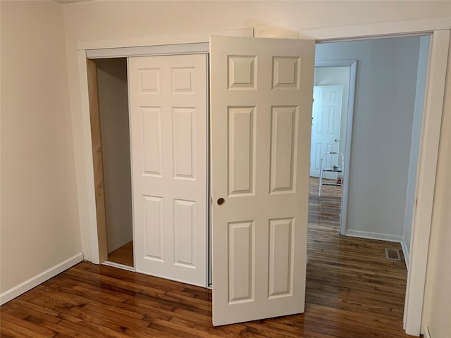 604 Basket Rd, Long Eddy, NY 12760 - hallway with dark wood finished floors and baseboards