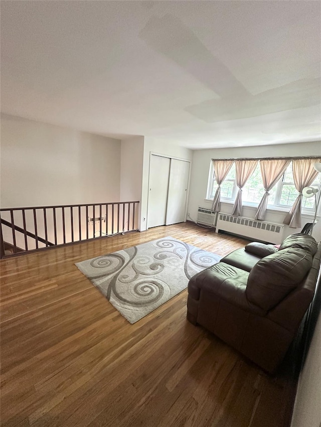 150-85 70th Rd Unit 2B, Flushing, NY 11367 - living area featuring light wood-style floors and a baseboard radiator