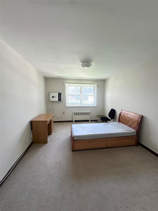 150-85 70th Rd Unit 2B, Flushing, NY 11367 - carpeted bedroom featuring radiator heating unit and an AC wall unit