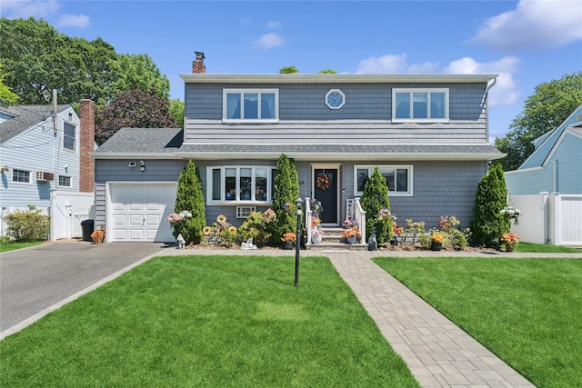 89 3rd Ave, Massapequa Park, NY 11762 - view of front facade with a garage, asphalt driveway, a chimney, and roof with shingles