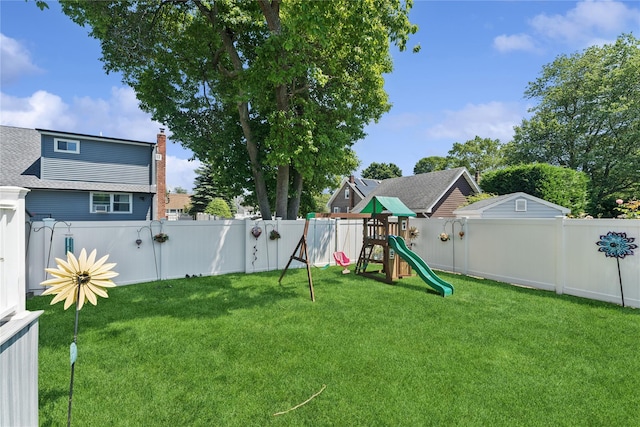 89 3rd Ave, Massapequa Park, NY 11762 - fenced backyard featuring a playground