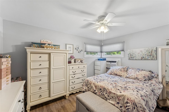 89 3rd Ave, Massapequa Park, NY 11762 - bedroom with dark wood finished floors, ceiling fan, and cooling unit