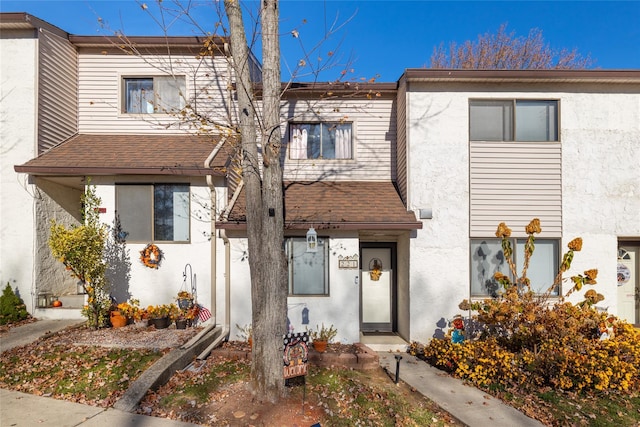 221 Winding Woods Loop Unit 55, Staten Island, NY 10307 - multi unit property featuring a shingled roof and stucco siding