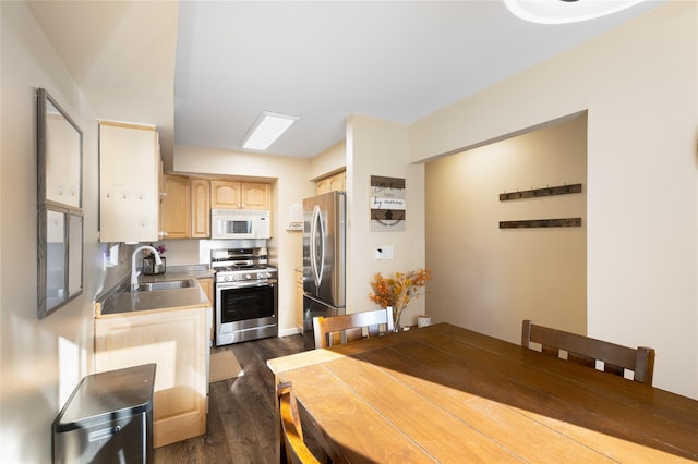 221 Winding Woods Loop Unit 55, Staten Island, NY 10307 - kitchen featuring appliances with stainless steel finishes, light brown cabinets, and dark wood-type flooring