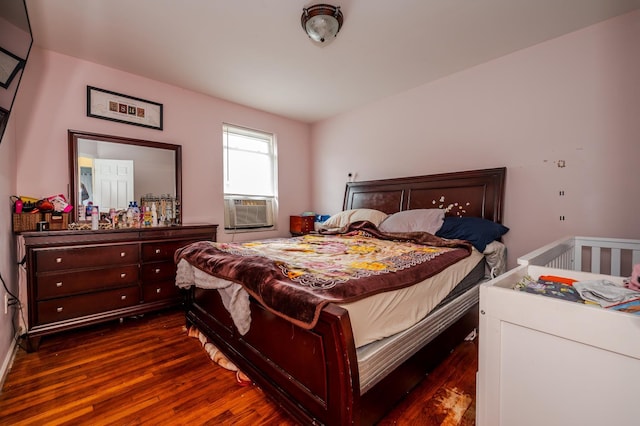 989 Sacket Ave, Bronx, NY 10462 - bedroom with dark wood-style floors and cooling unit