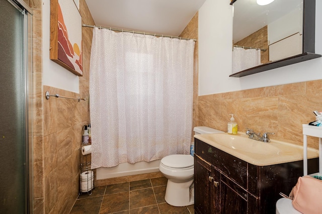 989 Sacket Ave, Bronx, NY 10462 - bathroom featuring tile walls, vanity, wainscoting, shower / bathtub combination with curtain, and tile patterned floors