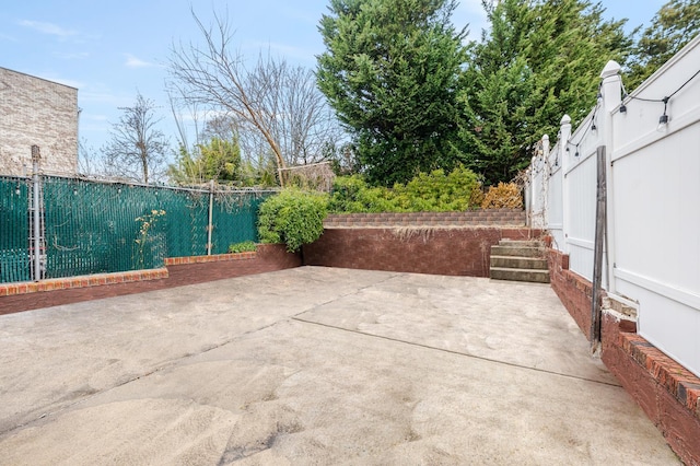 989 Sacket Ave, Bronx, NY 10462 - fenced backyard with a patio area
