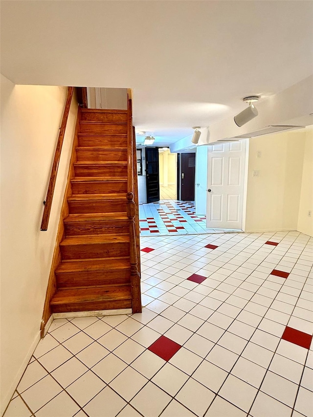 7267 Yellowstone Blvd, Forest Hills, NY 11375 - staircase featuring tile patterned flooring and baseboards
