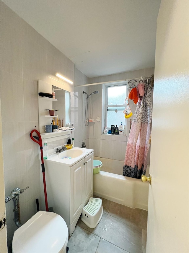 14444 41st Ave Unit 1M, Flushing, NY 11355 - bathroom with shower / bath combination with curtain, vanity, tile patterned floors, and tile walls