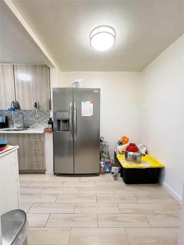 14444 41st Ave Unit 1M, Flushing, NY 11355 - kitchen featuring stainless steel fridge with ice dispenser, light countertops, tasteful backsplash, and modern cabinets