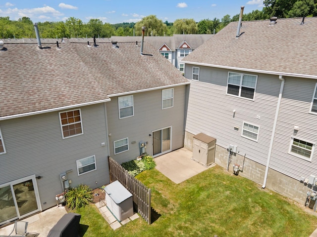 256 Quassaick Ave Unit 17, New Windsor, NY 12553 - rear view of property with a shingled roof and a patio