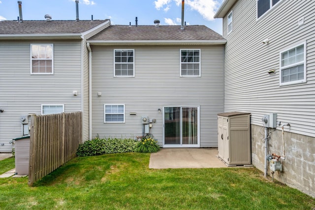 256 Quassaick Ave Unit 17, New Windsor, NY 12553 - back of property with a patio area, a lawn, and a shingled roof