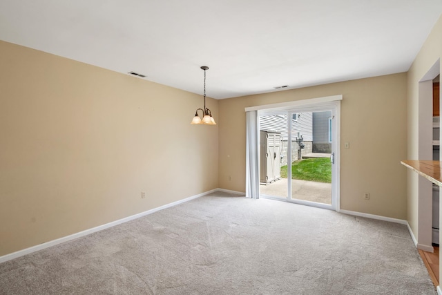 256 Quassaick Ave Unit 17, New Windsor, NY 12553 - spare room featuring a chandelier and light carpet