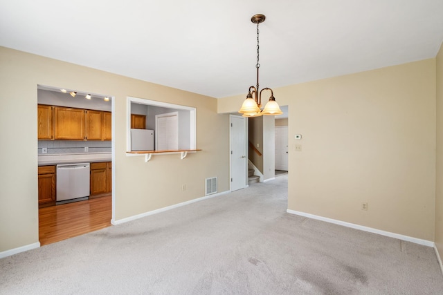 256 Quassaick Ave Unit 17, New Windsor, NY 12553 - spare room featuring light colored carpet and stairs