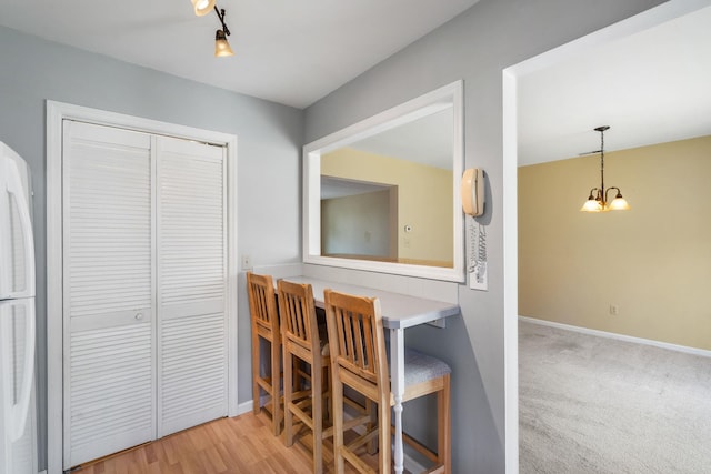 256 Quassaick Ave Unit 17, New Windsor, NY 12553 - dining space with a chandelier and baseboards