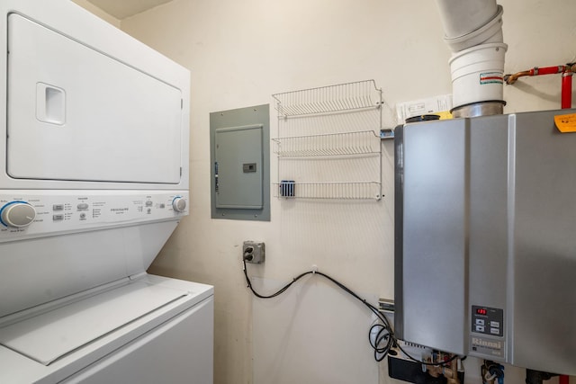 256 Quassaick Ave Unit 17, New Windsor, NY 12553 - washroom with tankless water heater, estacked washer and dryer, and electric panel