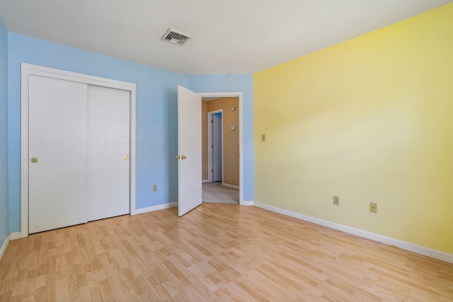 256 Quassaick Ave Unit 17, New Windsor, NY 12553 - unfurnished bedroom featuring light wood-style flooring and a closet