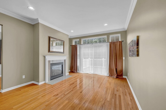 2509 Sylvan Loop, Wappingers Falls, NY 12590 - unfurnished living room with light wood finished floors, crown molding, a premium fireplace, and recessed lighting