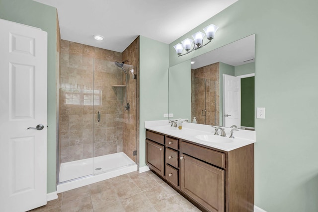 2509 Sylvan Loop, Wappingers Falls, NY 12590 - full bathroom with double vanity, a shower stall, and tile patterned flooring