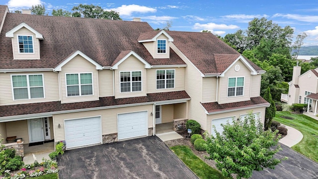 2509 Sylvan Loop, Wappingers Falls, NY 12590 - multi unit property with asphalt driveway, an attached garage, a shingled roof, and stone siding