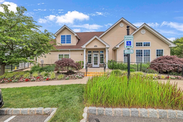 2509 Sylvan Loop, Wappingers Falls, NY 12590 - view of front facade with roof with shingles and uncovered parking
