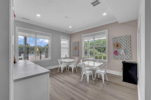 2509 Sylvan Loop, Wappingers Falls, NY 12590 - dining space featuring light wood-style floors, ornamental molding, plenty of natural light, and recessed lighting