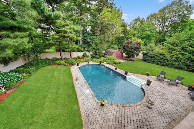 69 Oakland Pl, Nanuet, NY 10954 - view of pool with a storage shed, a fenced backyard, and a patio