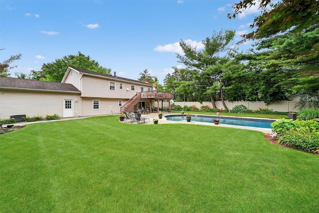69 Oakland Pl, Nanuet, NY 10954 - fenced backyard with stairway and a wooden deck