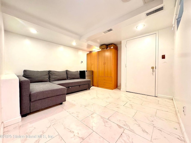 3516 Fillmore Ave, Brooklyn, NY 11234 - living area featuring light marble finish flooring and recessed lighting