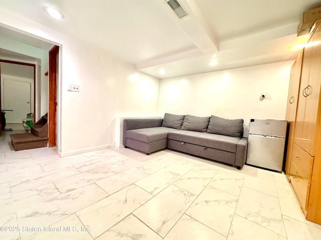 3516 Fillmore Ave, Brooklyn, NY 11234 - living area with recessed lighting, light marble finish flooring, and beam ceiling