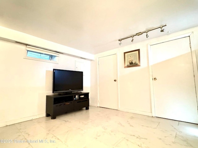 3516 Fillmore Ave, Brooklyn, NY 11234 - living room featuring track lighting and light marble finish floors