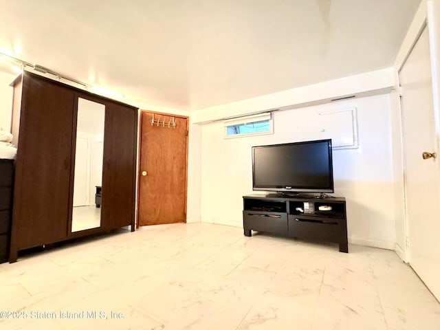 3516 Fillmore Ave, Brooklyn, NY 11234 - living room featuring light marble finish flooring