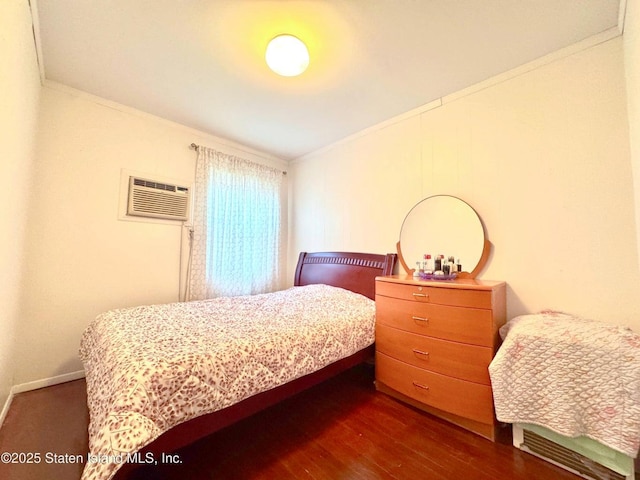 3516 Fillmore Ave, Brooklyn, NY 11234 - bedroom with a wall mounted AC, ornamental molding, and dark wood-style floors