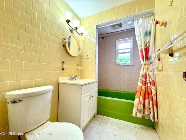 3516 Fillmore Ave, Brooklyn, NY 11234 - bathroom featuring tile walls, vanity, shower / bath combination with curtain, and tile patterned floors