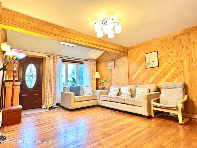 3516 Fillmore Ave, Brooklyn, NY 11234 - living area with wooden walls and hardwood / wood-style flooring