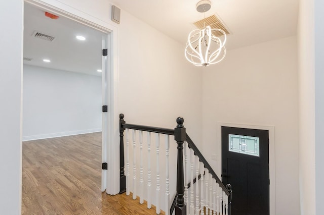 24 Sol Dr, Carmel, NY 10512 - stairs featuring wood finished floors, a chandelier, and recessed lighting