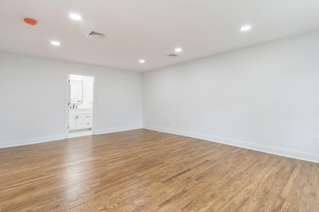 24 Sol Dr, Carmel, NY 10512 - empty room with light wood-type flooring, recessed lighting, and a smoke detector