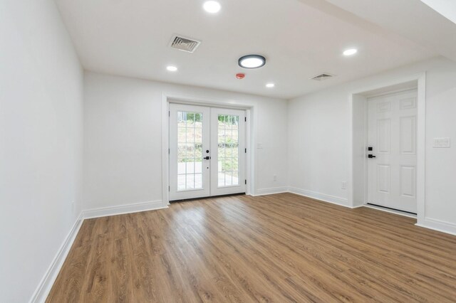 24 Sol Dr, Carmel, NY 10512 - unfurnished room with french doors, wood finished floors, and recessed lighting