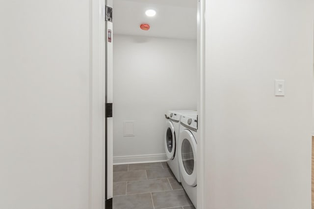 24 Sol Dr, Carmel, NY 10512 - laundry area featuring washer and dryer and light tile patterned flooring