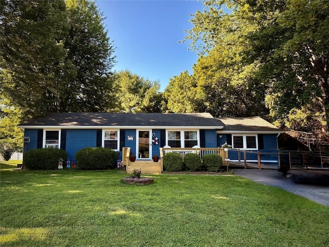 18 Amherst Rd, Red Hook, NY 12571 - ranch-style house featuring a front yard and a deck