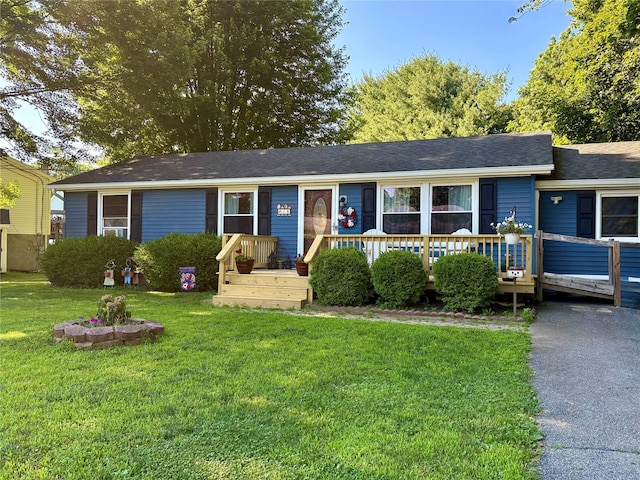 18 Amherst Rd, Red Hook, NY 12571 - single story home with a front yard and a deck