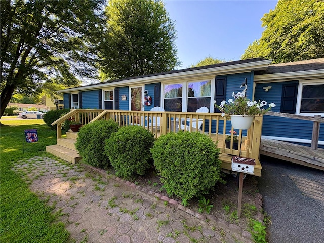 18 Amherst Rd, Red Hook, NY 12571 - ranch-style house featuring a deck
