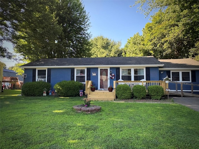 18 Amherst Rd, Red Hook, NY 12571 - single story home with a front yard and a deck