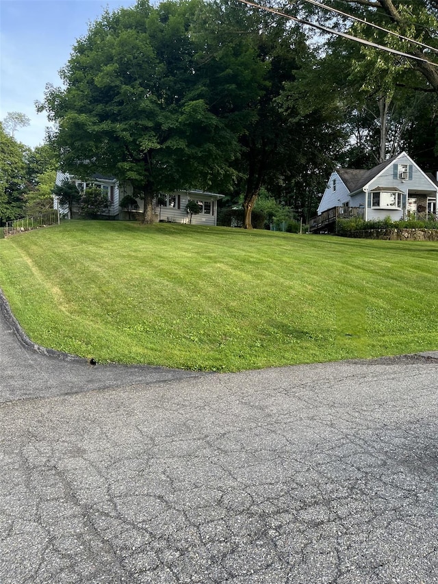 11 Crescent Dr, Cortlandt Manor, NY 10567 - view of green lawn featuring view of wooded area